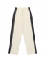 Trim strip pants cream 