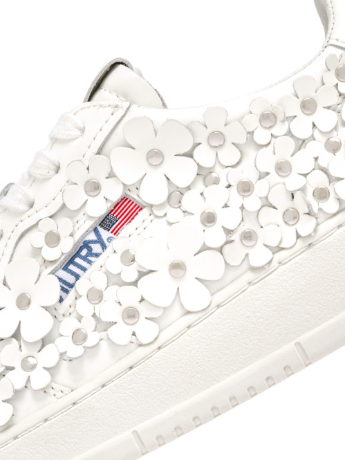 Medalist low patent flower sneaker white 